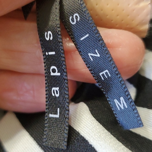 Haulter jumpsuits. Black and white striped top. Black bottom Wide leg. By Lepis - Picture 7 of 8